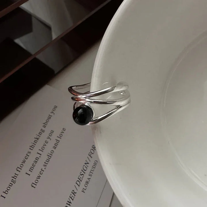 Eleganter Damenring aus 925 Sterlingsilber mit großem schwarzem Onyx-Stein.