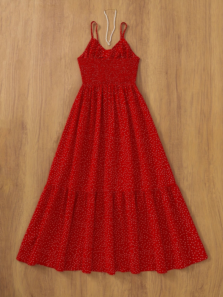 Elegantes Damenkleid, Vintage-Look, gepunktet, mit Volants, ideal für festliche Anlässe.