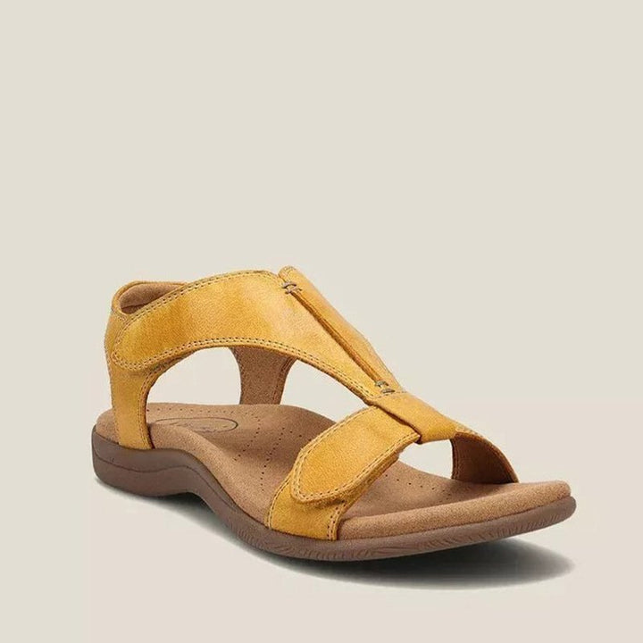 Beige ergonomische Damensandalen, orthopädisch, mit Fußgewölbeunterstützung und rutschfester Sohle.
