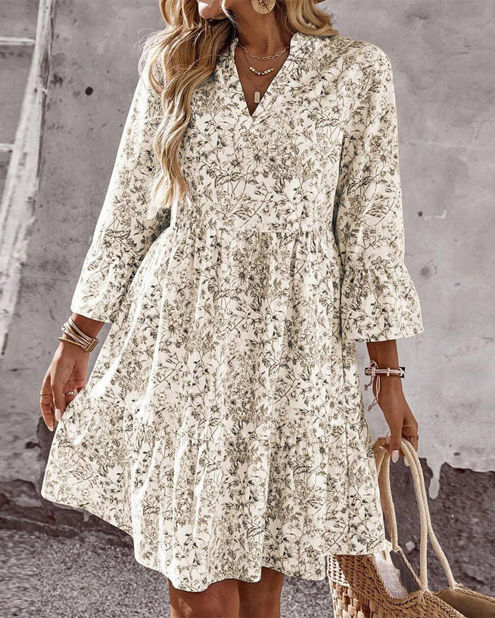 Stylisches Freizeitkleid in Beige für Damen, A-Linie, mit Blumenmuster, Rüschen und Stehkragen – perfekt für den Frühling.