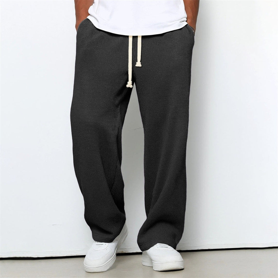 Komfortable Athleisure-Herrenhose, locker geschnitten für maximale Bewegungsfreiheit und Stil in der Freizeit.