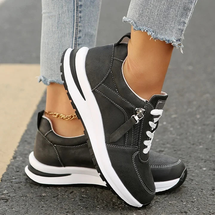 Trendige Damen-Sneaker in Grau-Gold, Reißverschluss & Schnürung für besten Komfort und Stil.