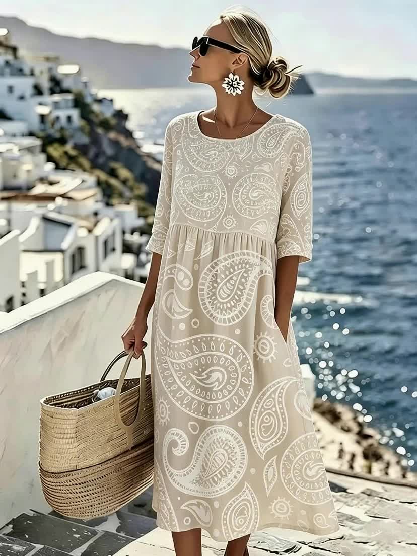 Gemustertes beiges Damen Midikleid mit elegantem Paisley-Print, ein fließendes Freizeitkleid für den Sommer.