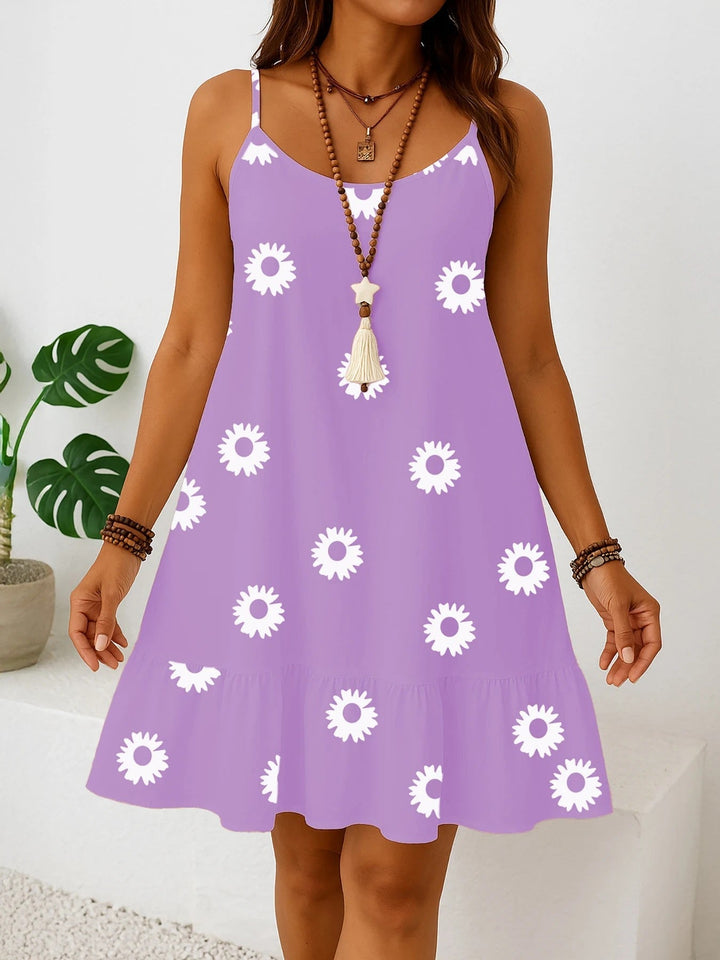 Stilvolles Damen Sommerkleid Plus Size, ärmellos, mit buntem Blumenmuster & fließendem Volant-Saum.