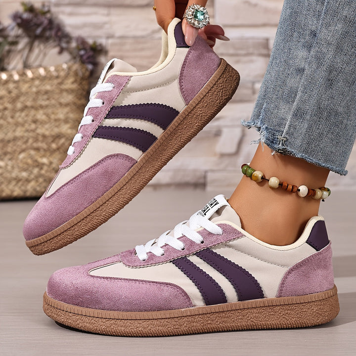 Schwarze Damen Retro Sneaker, vielseitige Freizeitschuhe für modische Streetwear.