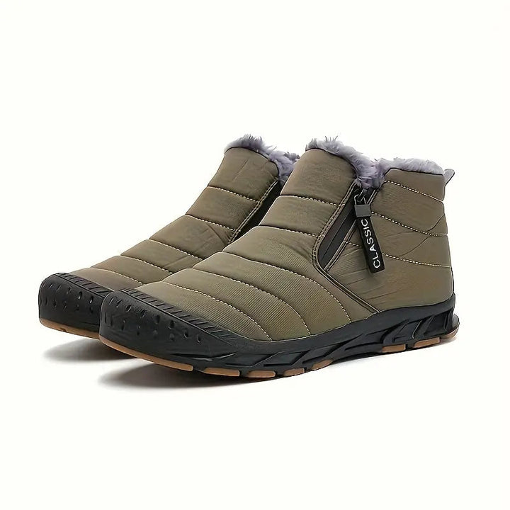 Robuste, rutschfeste Sohle der Damen Winterstiefel. Wasserdicht und kältebeständig für Schnee und Eis. Optimaler Outdoor-Halt.