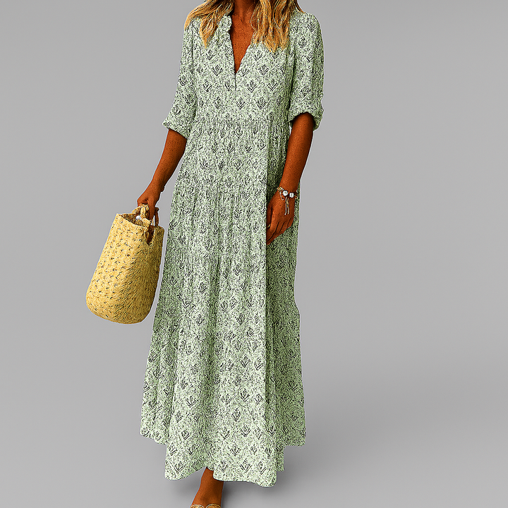 Pinkes, fließendes Damen Blumen Maxikleid. Bequemes A-Linie Sommerkleid mit V-Ausschnitt im Boho-Stil für Feste.