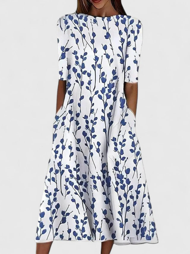 Elegantes Damen Midikleid mit Blumenmuster für Sommer & Freizeit. Stilvoll & bequem, ideal für Alltag oder Urlaub.
