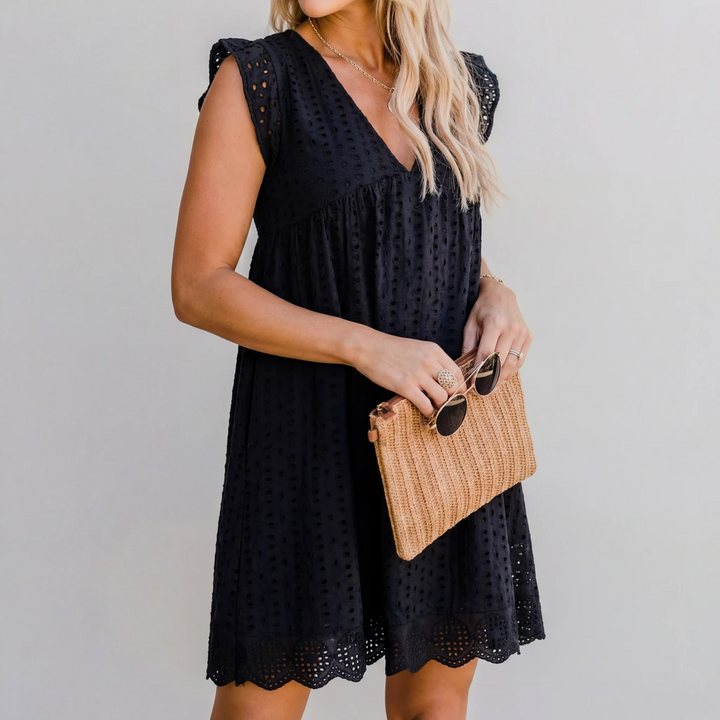 Damen Sommer Mini-Kleid mit V-Ausschnitt, ärmellos, entspannter Schnitt für lässige Eleganz.