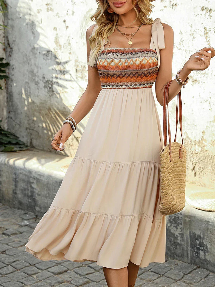 Lina apricot Spaghettiträger-Midikleid für Damen, stylisch und luftig, ein Must-have für den Sommer.