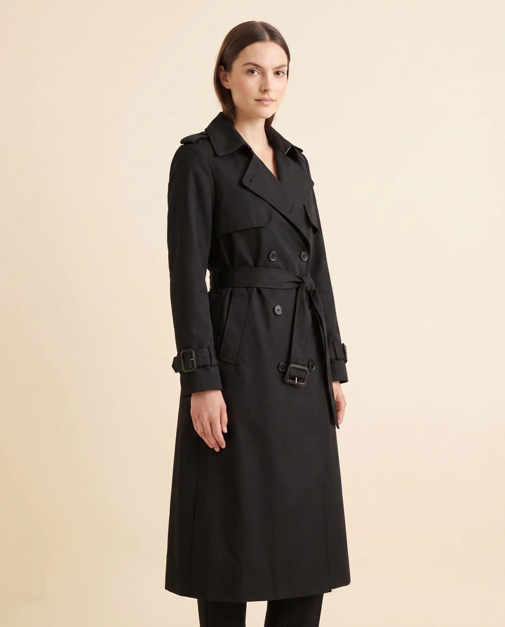 Damen Mode Trenchcoat, klassisch geschnitten mit Zweireiher und Taillengürtel, Frühling/Herbst.