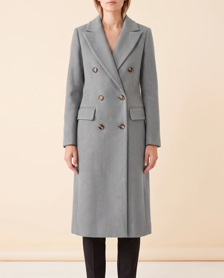 Eleganter Damen-Doppelreiher, lang & tailliert. Hochwertiger Wintermantel für Stil & Wärme.