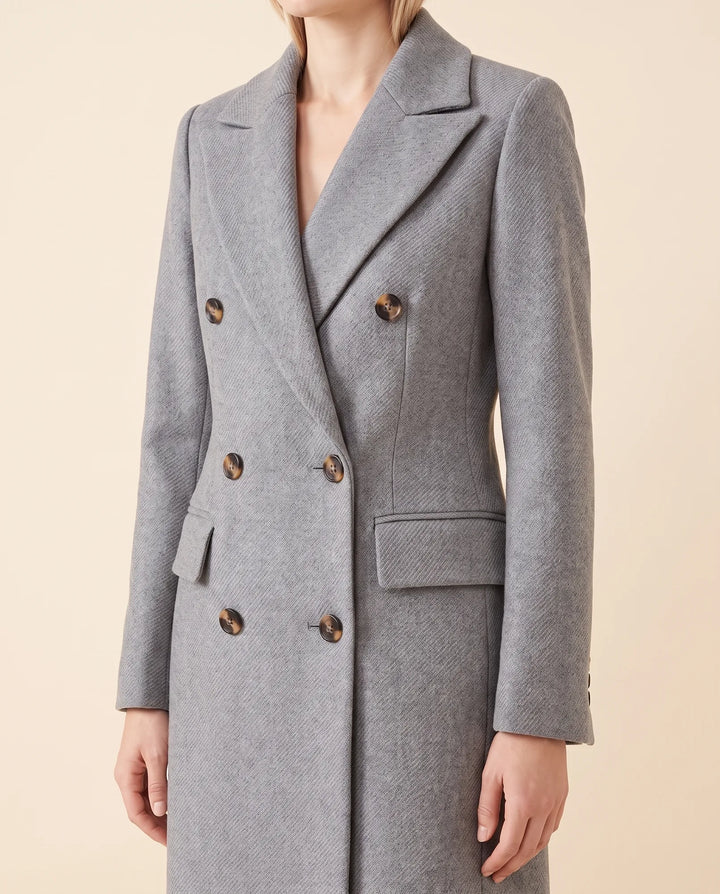 Schicker Damen Wintermantel, lang. Tailliert mit Zweireiher, ideal für elegante Freizeitlooks.