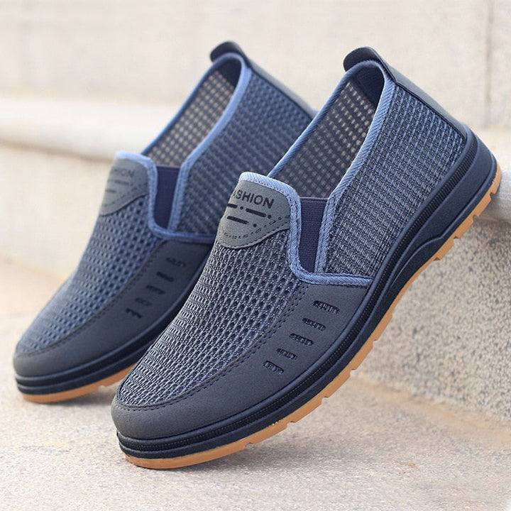 Stylische Herren Noah Sneaker in Seitenansicht. Leichte, atmungsaktive Mesh-Freizeitschuhe mit bequemem Tragegefühl.