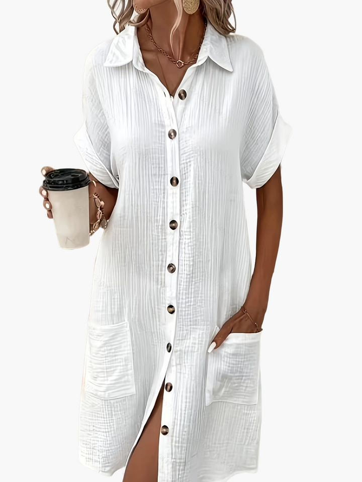 Modisches Damen Tunikakleid, ideal als Sommerkleid mit Kurzarm, Knopfleiste und Taschen.