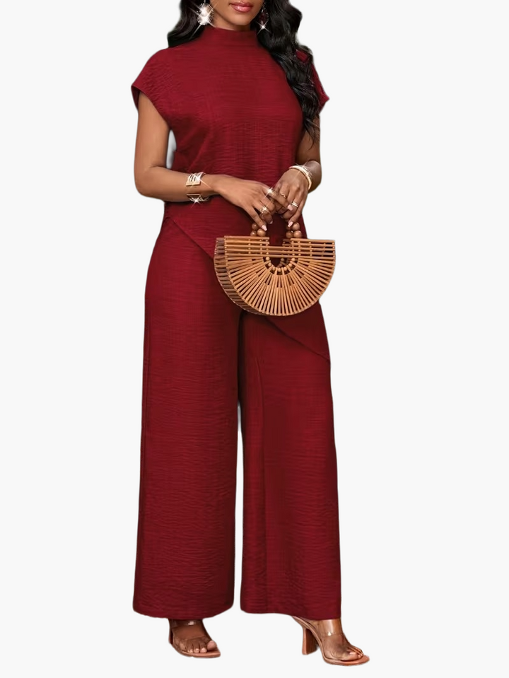 Eleganter Damen Jumpsuit mit asymmetrischem Überwurf, vielseitiger Einteiler für modische Auftritte.