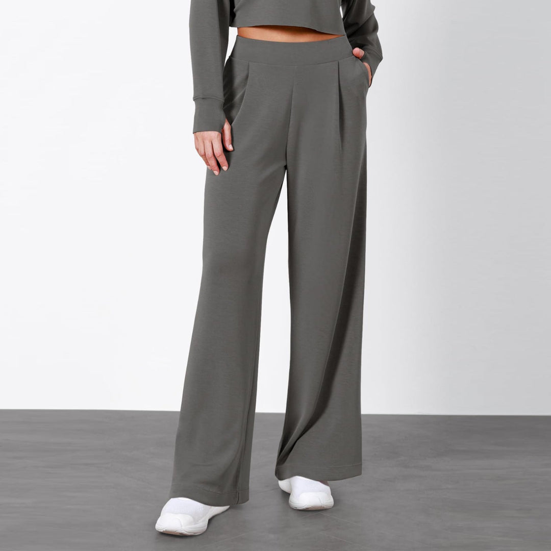 Marineblaue Damen Hose mit hohem Bund und geradem Bein. Moderne Eleganz, ideal für Büro oder schicke Freizeit-Outfits.