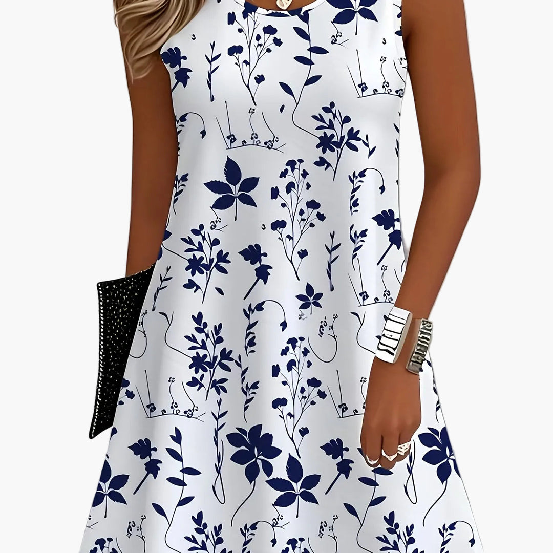 Ärmelloses Damen Sommerkleid mit wunderschönem Blumenmuster. Perfekt als Freizeit- und Urlaubskleid.