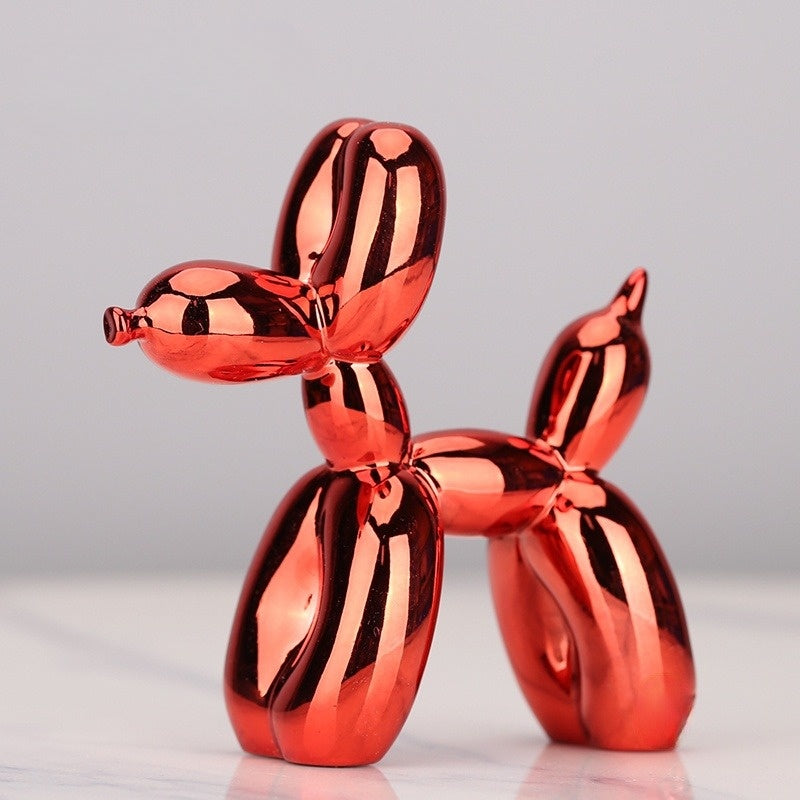 Farbig glänzende Ballonhund Skulptur aus Kunstharz. Modische Deko Figur für Wohnzimmer, Innenbereich und Zuhause.