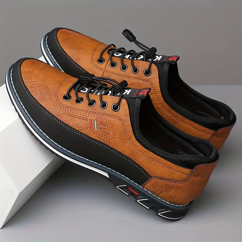 Grauer Herren Freizeitsneaker, bequemer Schnürschuh für Freizeit und moderne Herrenmode.