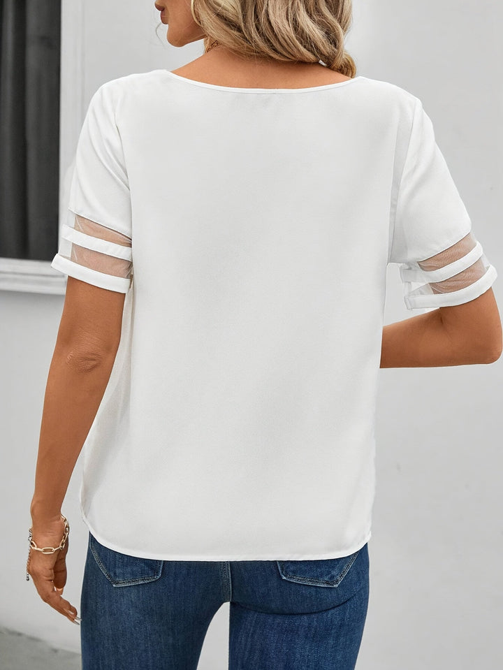 Bluse Damen: Elegante Sommerbluse mit Blumenmuster, asymmetrisches Design, komfortabel.