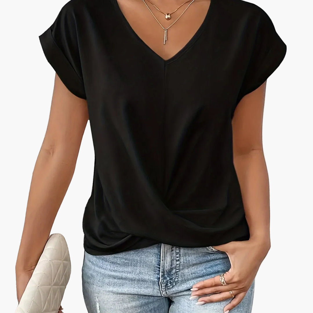 Lässige Damenbluse mit V-Ausschnitt, Wickeldetail, perfekt für einen entspannten Look.