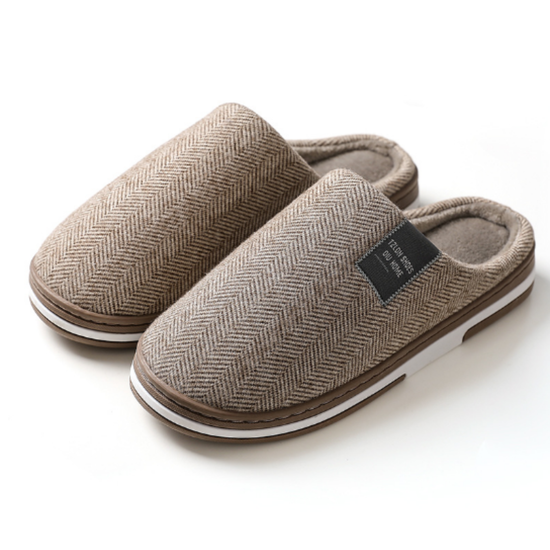 Stilvolle Damen Herringbone Hausschuhe für Zuhause. Komfortable Slip-On Pantoffeln mit elegantem Webmuster.