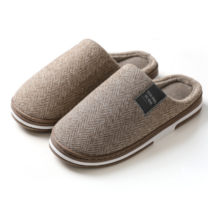 Stilvolle Damen Herringbone Hausschuhe für Zuhause. Komfortable Slip-On Pantoffeln mit elegantem Webmuster.