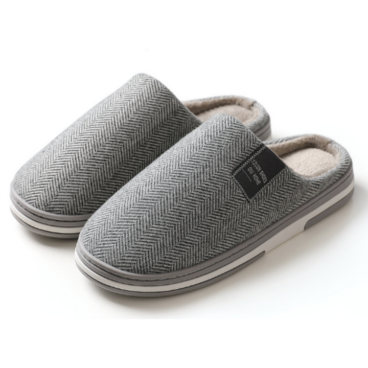 Bequeme Damen Herringbone Hausschuhe, ideal als Hausmode oder Geschenkidee. Stilvoll und warm für jede Frau.