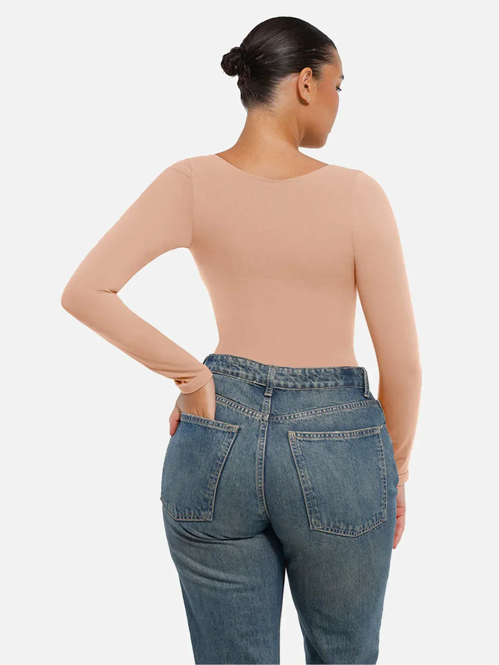 Effizienter Langarm Bodysuit mit Bauchweg-Effekt, unsichtbar und bequem unter der Kleidung.