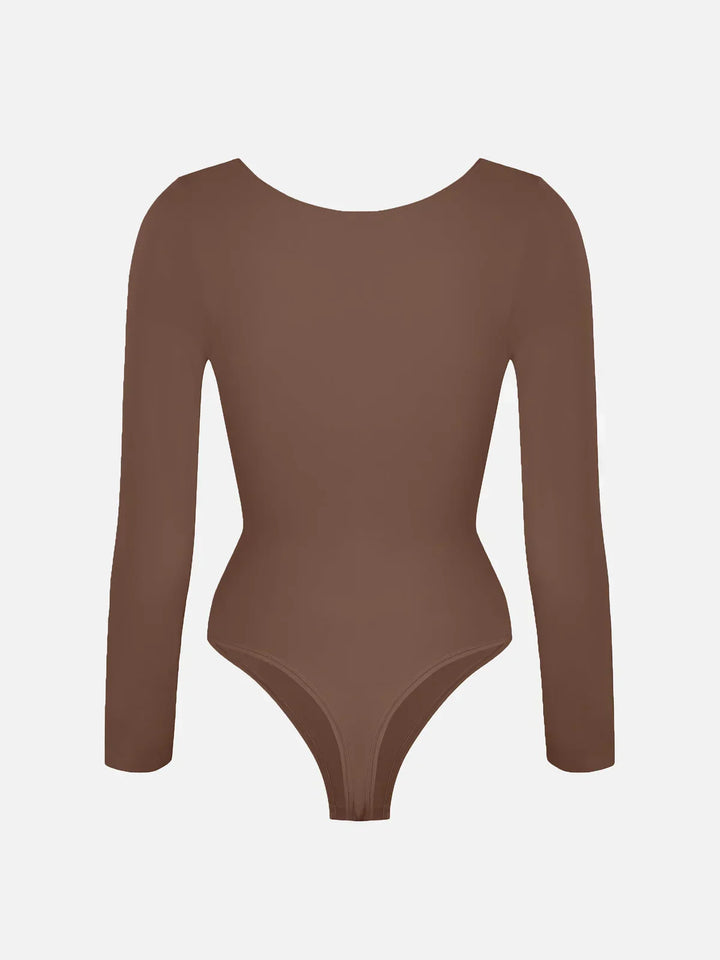 Femininer Langarm Bodysuit, figurformend, perfekt für eine definierte Körpermitte und schlanke Kurven.