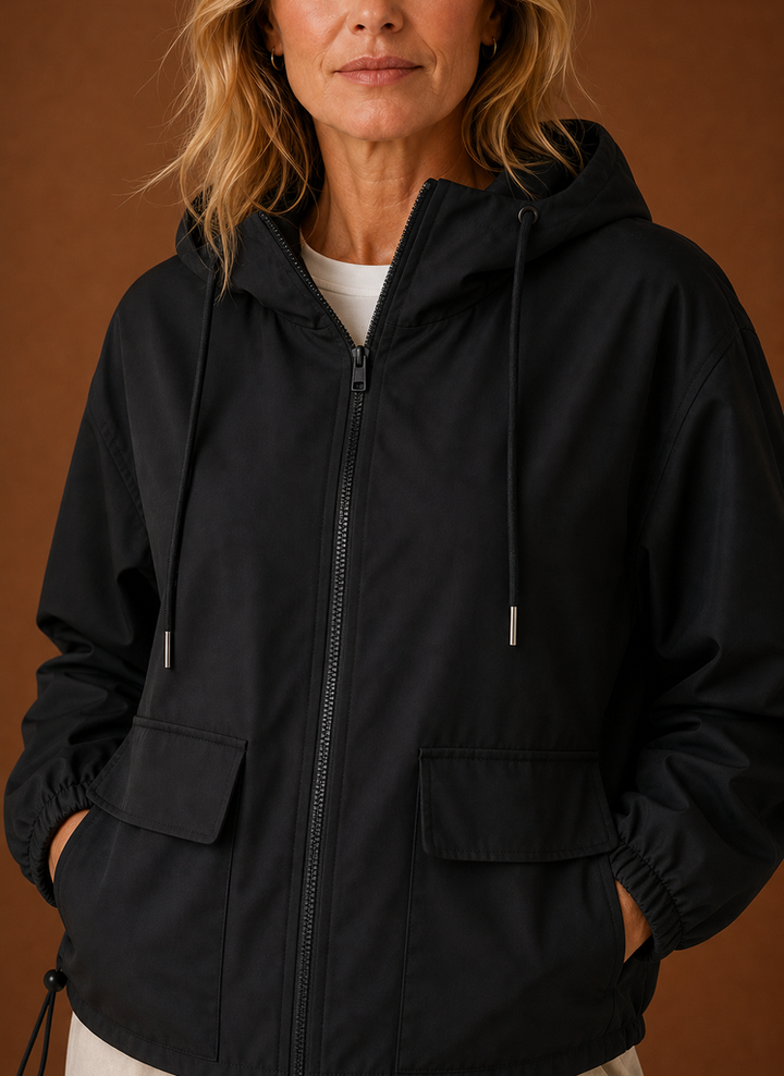 Damen Kapuzenjacke, schwarz, ultraleicht und winddicht, ideal für Spaziergänge im Herbst.