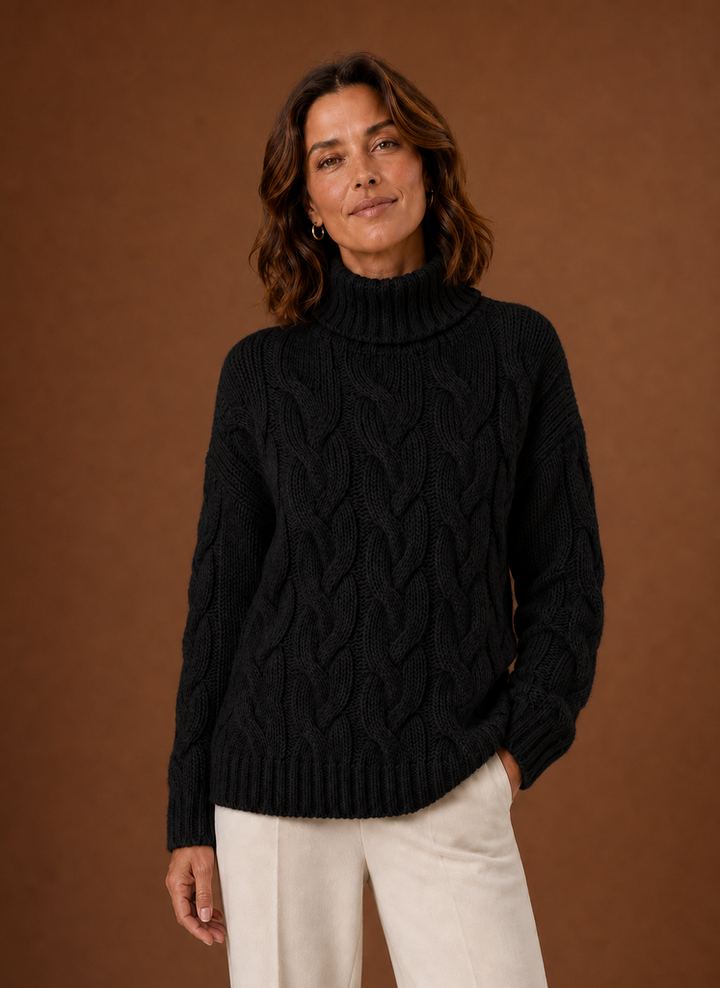 Eleganter Damen Pullover mit Zopfmuster, perfekt kombinierbar für gemütliche Winterlooks.