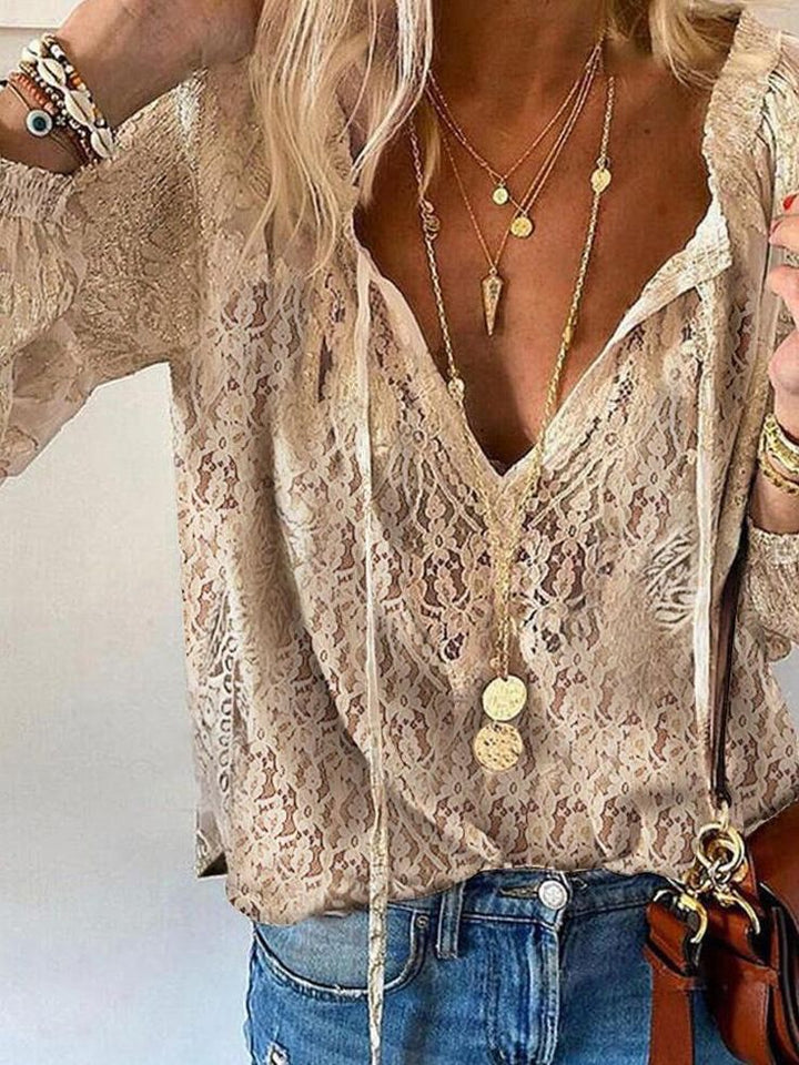 Lässige Damen Boho Bluse mit V-Ausschnitt und kurzen Ärmeln, perfekt für den Sommer.