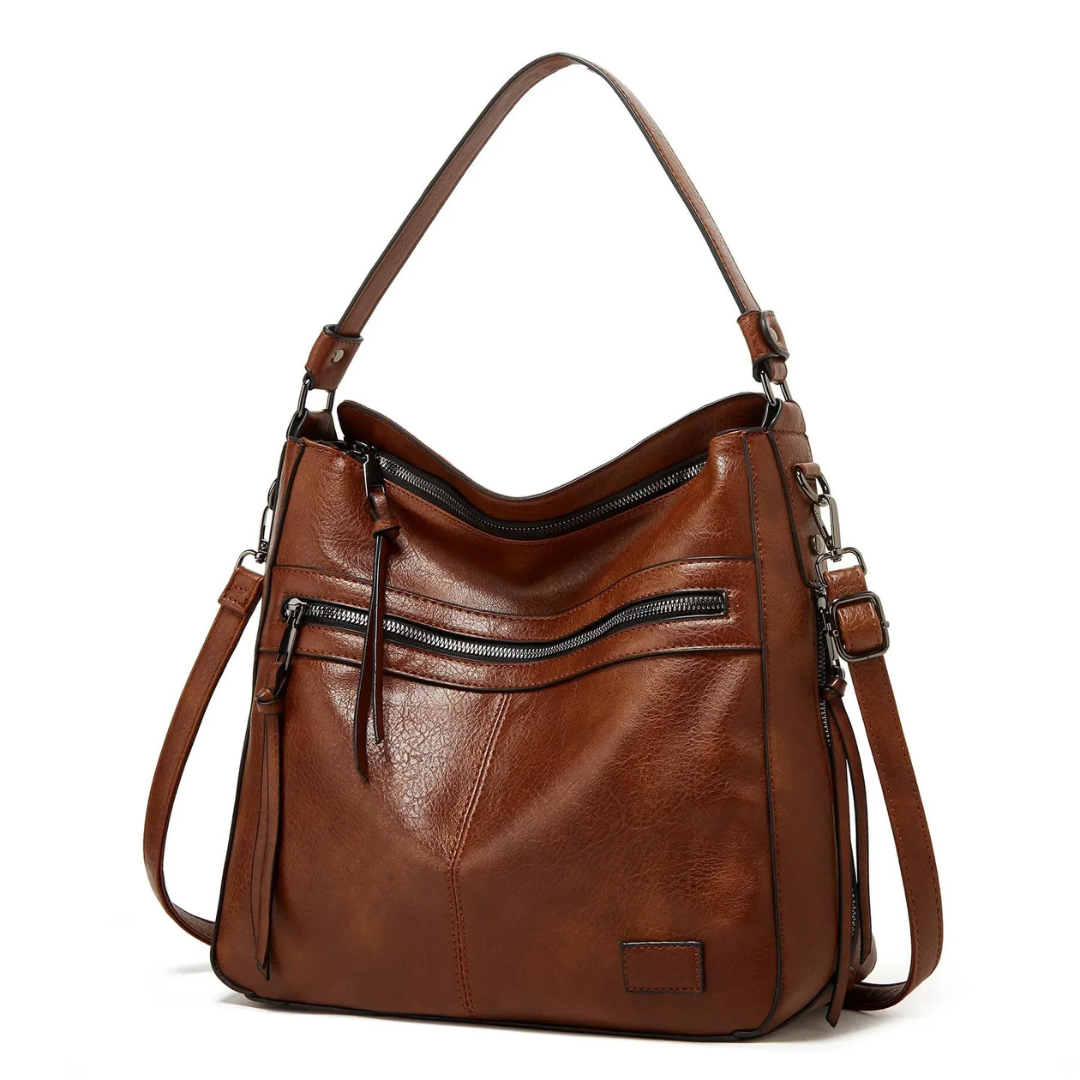 Geräumige Damen Handtasche Elodie, als praktische Schultertasche ideal für den täglichen Gebrauch, elegantes Accessoire.