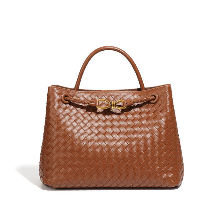 Zeitlose Ruby Handtasche, geflochten aus veganem Leder, als elegante Schultertasche für Damen. Klassisches Design.
