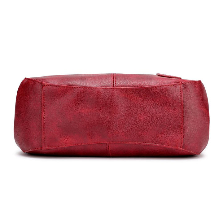 Robuste Alltagstasche für Damen: geräumige PU Schultertasche mit Organizer & Schnalle.