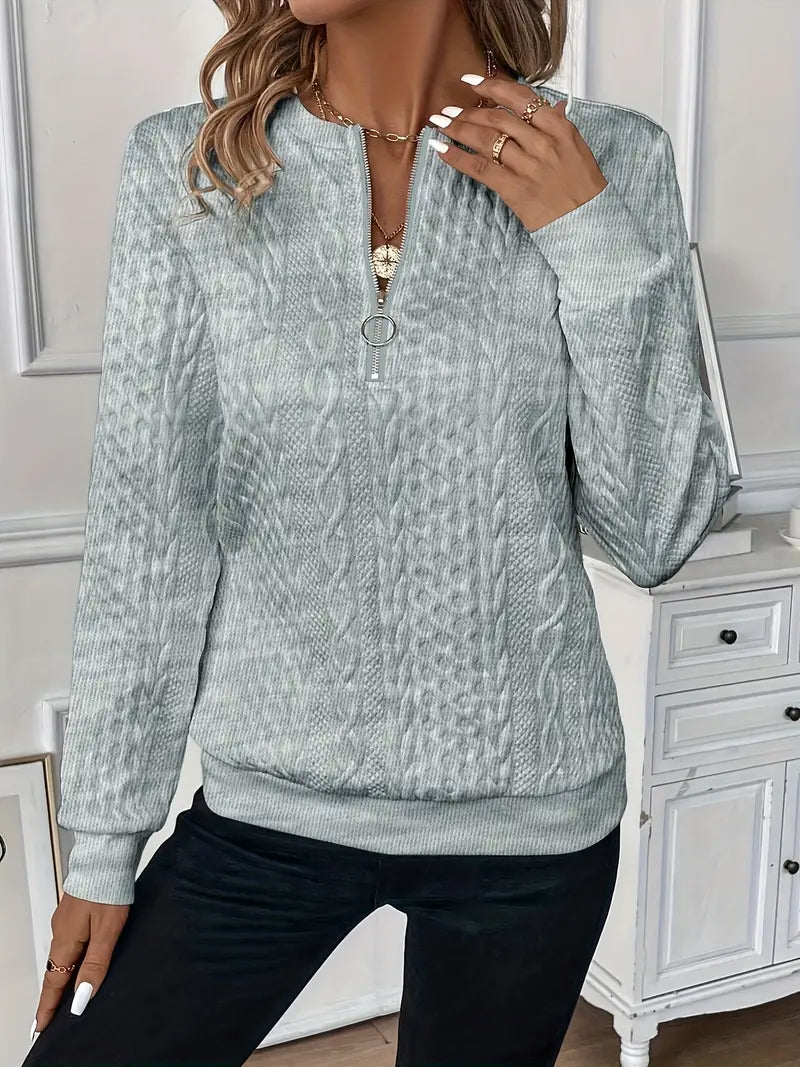 Damen-Langarmpullover mit Stehkragen und Reißverschluss. Bequem und modisch für jede Frau.