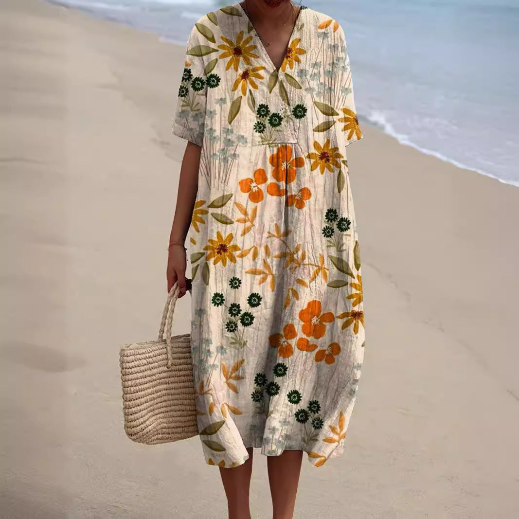 Komfortables leichtes Damen Sommerkleid Talia mit floralem Muster & V-Ausschnitt, perfekt für heiße Tage.