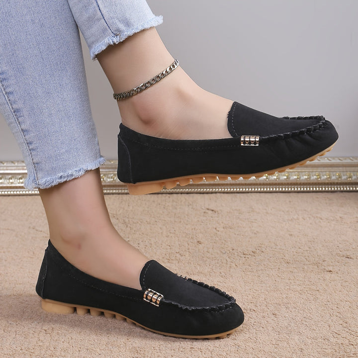 Hochwertige Damen Flachschuhe: Komfortable Slipper in Dunkelbraun, strapazierfähig und stilvoll.