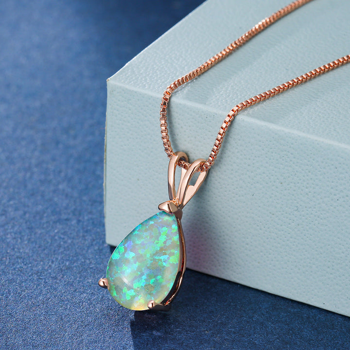 Vielseitige Damen Halskette mit Opal-Tropfenanhänger. Roségold & Silber Schmuck, elegant für den Alltag.