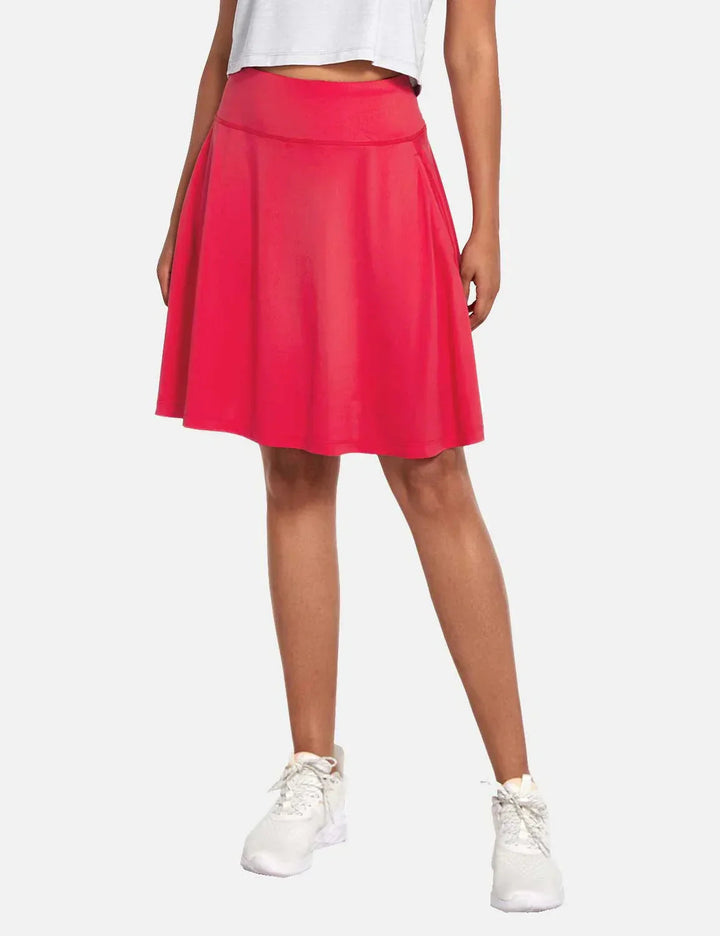 Sportlicher Damen Golfrock, UPF50+ Schutz, hoher Bund, integrierte Shorts & praktische Taschen.