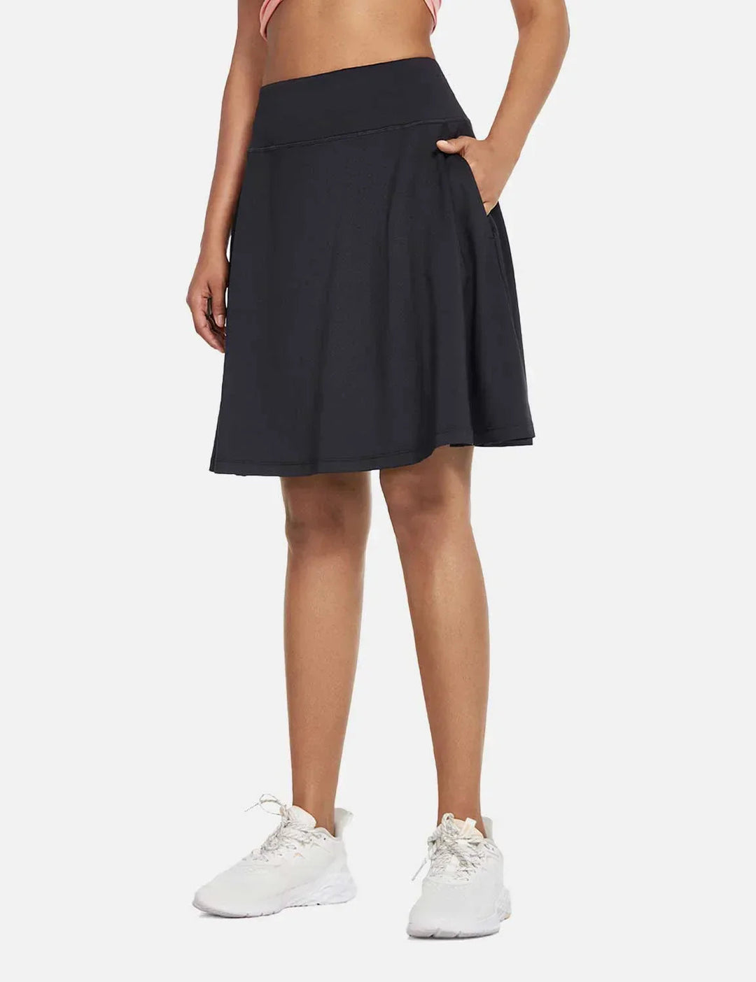 Damen Golfrock, UPF50+ Schutz, hoher Bund, mit versteckten Shorts und praktischen Seitentaschen.