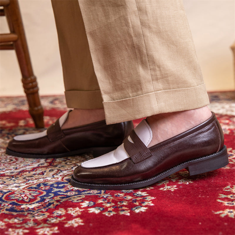 Stylische Herren Penny Loafer in Dunkelbraun, vielseitige Loafer aus Leder für den modernen Mann.