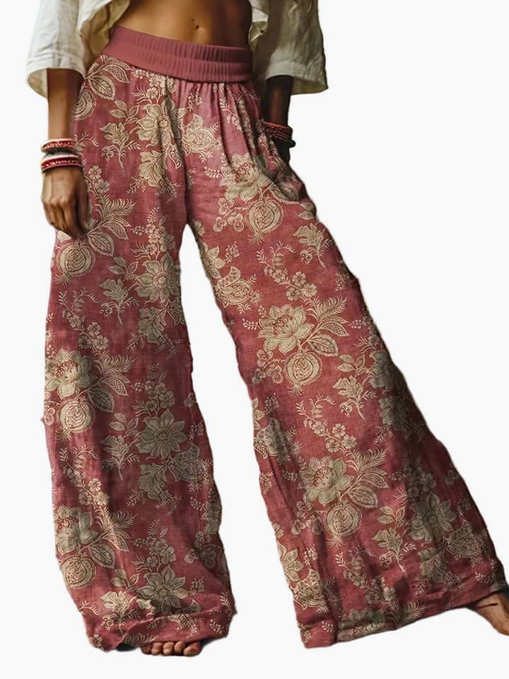 Locker sitzende Damenhose, weite Beine, buntes Blumenmuster, bequem für Freizeit, Sommer & Strand.