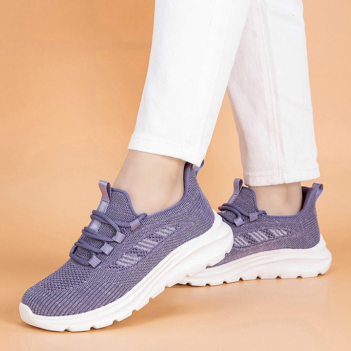 Vielseitige lila Damen Sneaker. Atmungsaktiver Freizeitschuh & Sportschuh mit elastischer Schnürung & rutschfester Sohle.