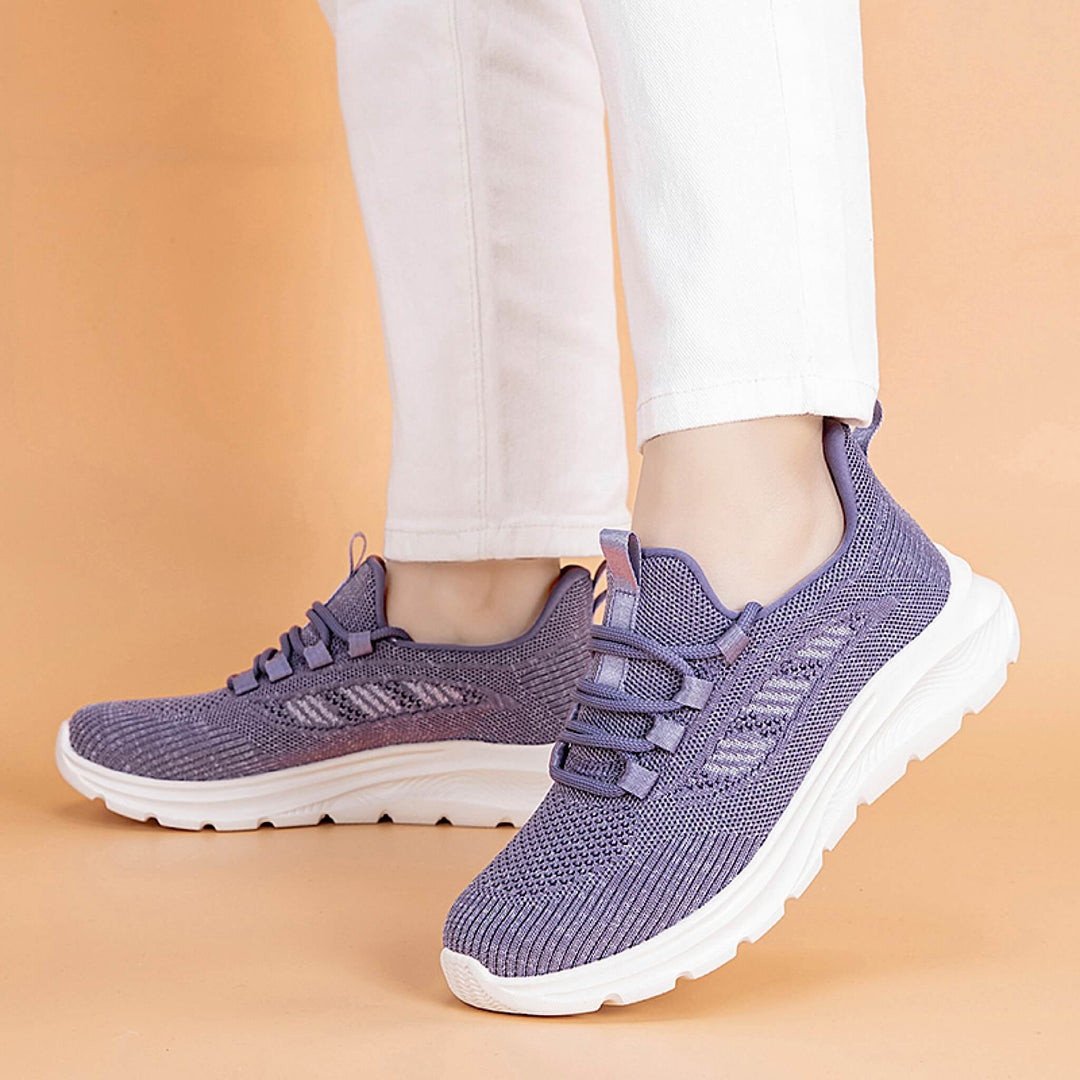 Stylische lila Damen Sneaker, atmungsaktiv & rutschfest. Ideal als leichter Freizeitschuh oder bequemer Sportschuh.