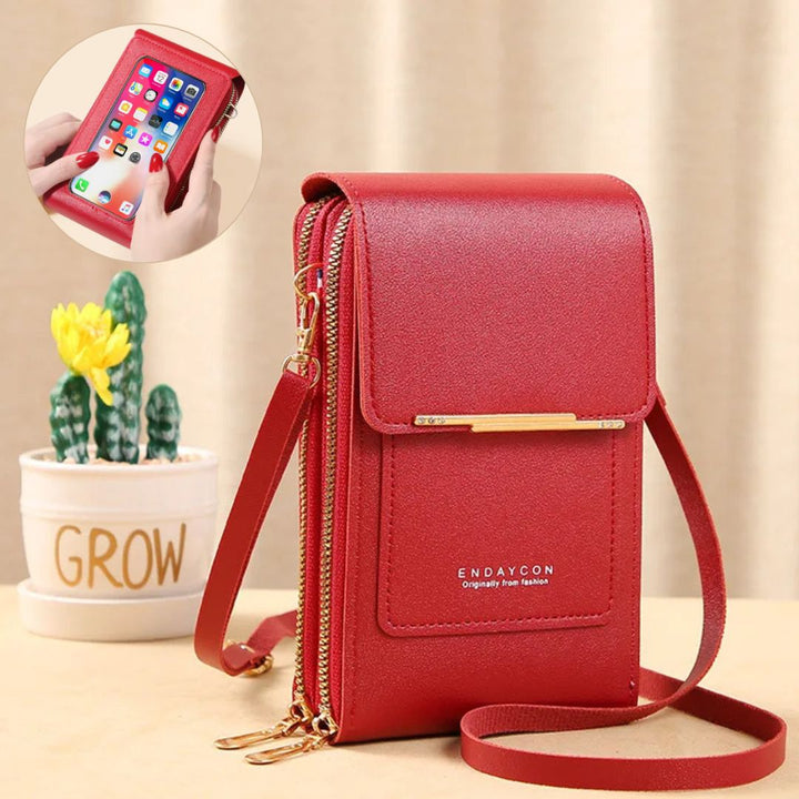 Funktionale Damen Crossbody Bag mit einfacher Touchscreen-Bedienung des Handys durchs Fenster.