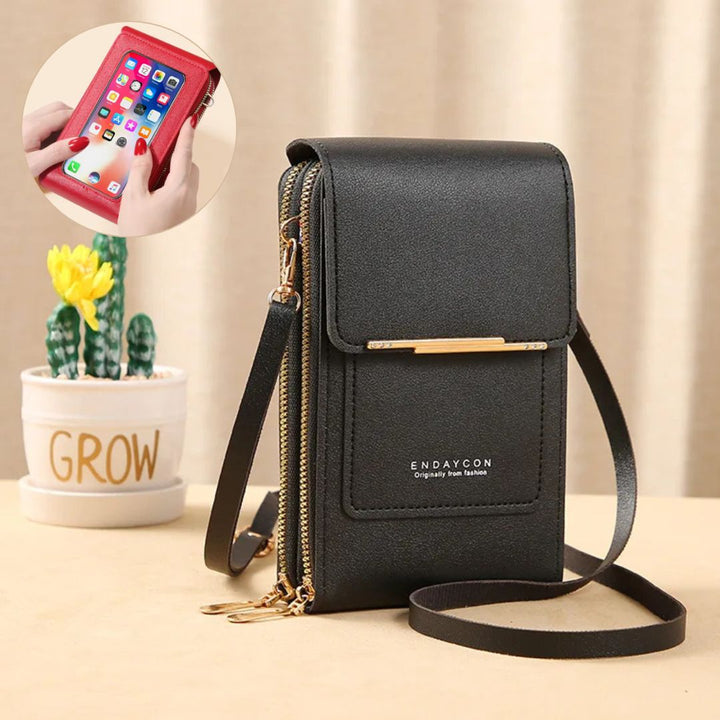 Moderne Damen Handytasche aus Kunstleder mit separaten Fächern für Karten und Scheine.