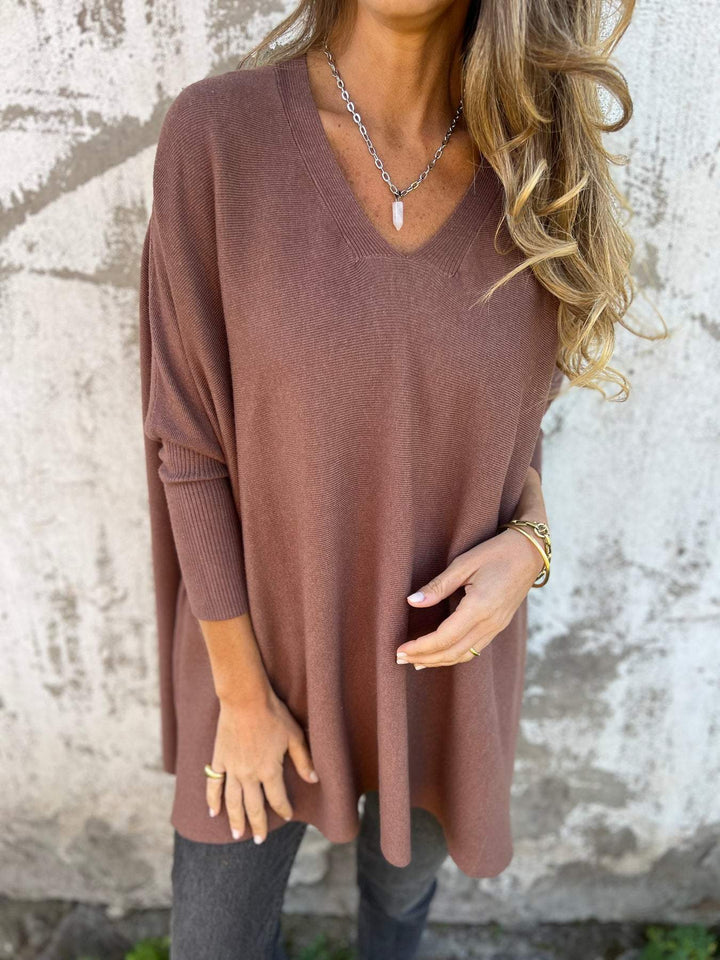 Eleganter Damen Pullover mit V-Ausschnitt. Ein vielseitiges Langarmshirt für jede Jahreszeit & Damenmode.